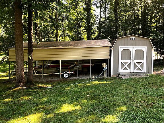 Carport and yard barn