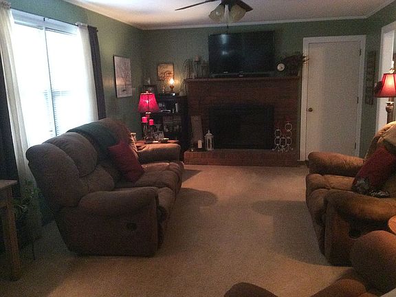Den with Wood Fireplace