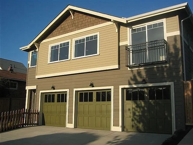 Unit is in back; garage on right belongs to unit