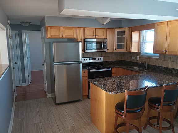 2nd image of 6920 W 109th St Unit 1B