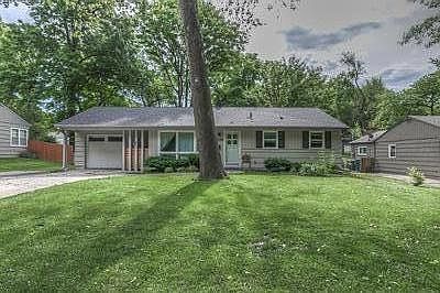 Curb appeal 
New garage door with auto opener and keypad. Two-car driveway.
Newer roof and gutters.
