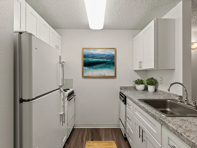 Updated Tacoma kitchen with sleek countertops and plenty of cabinet space. Updated Tacoma kitchen with sleek countertops and plenty of cabinet space.