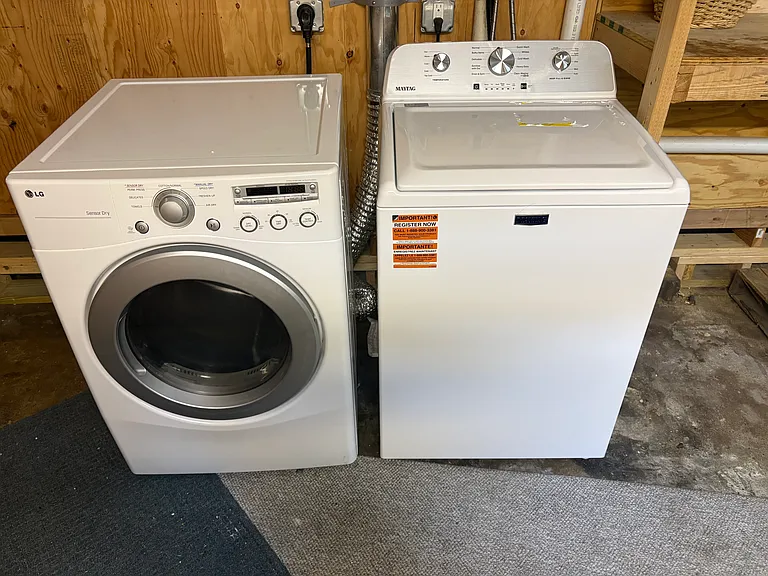 Dedicated washer and dryer in connected storage area