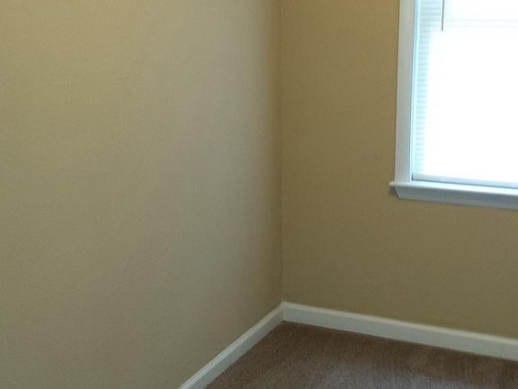 This is a small room that can be used as an office or storage.