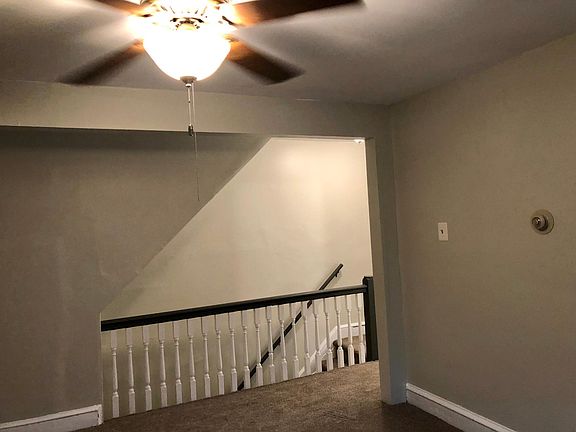 freshly painted ceilings, walls, and trim. living room with ceiling fan