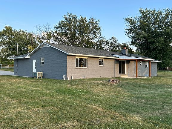 Back of house with newly built covered porch