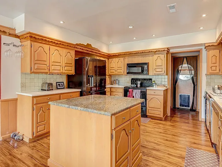 10950 W 71st Pl — Photo 3