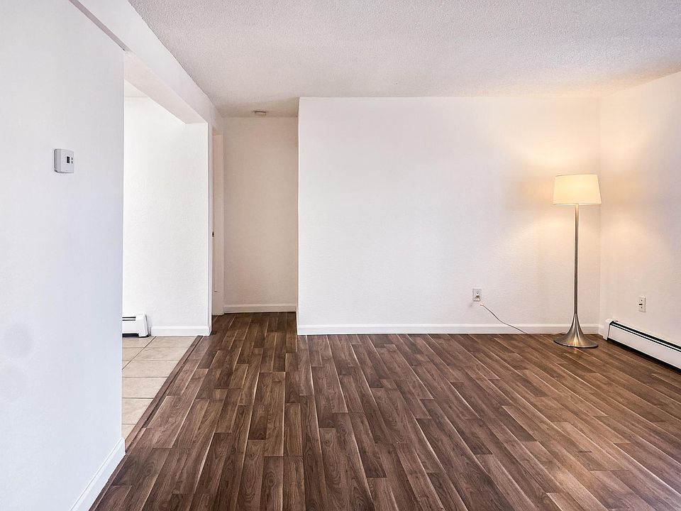 Living room and kitchen/dining. Hallway to bedroom.