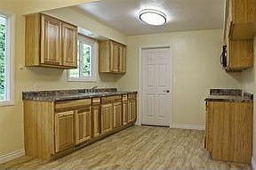 All new cabinets, flooring, paint