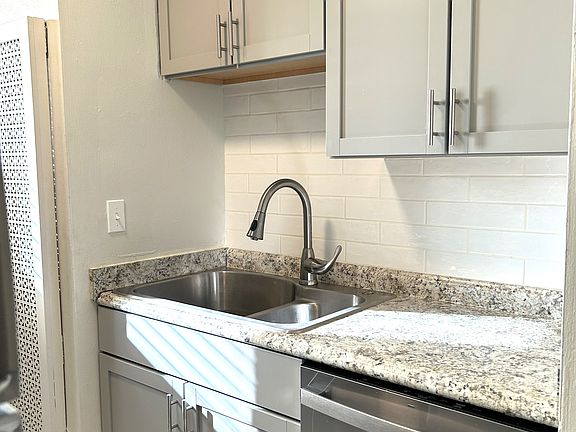 Kitchen w/ new sink, faucet, cabinets, countertops, etc.