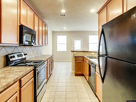 Spacious Kitchen with Plenty of Cabinets