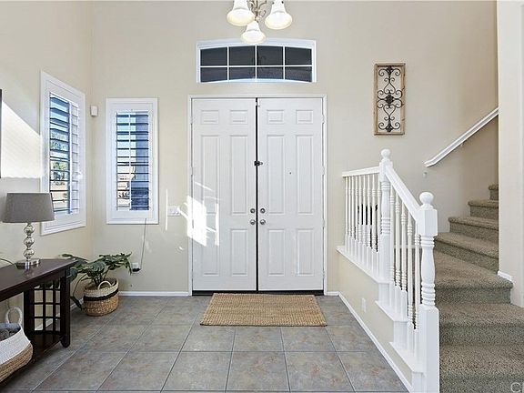Front entrance opens to high ceiling