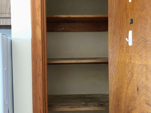 Pantry to right of fridge