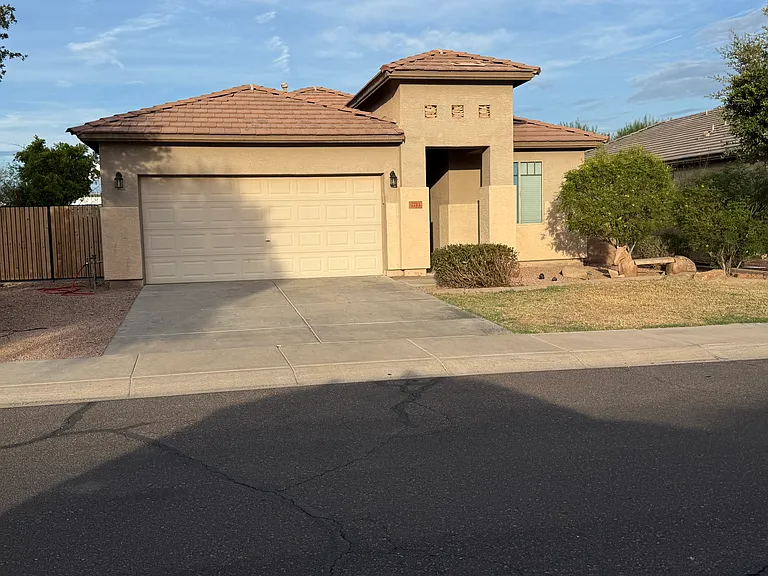 7711 S 68th Dr — Photo 1