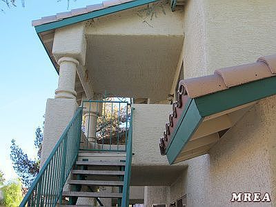 Stairway going up to Condo