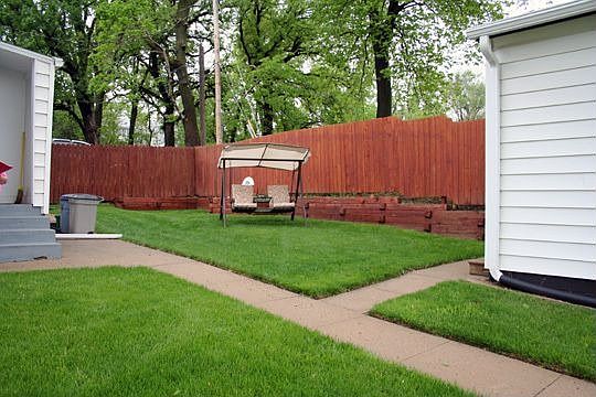 FENCED BACKYARD W/LARGE STORAGE SHED