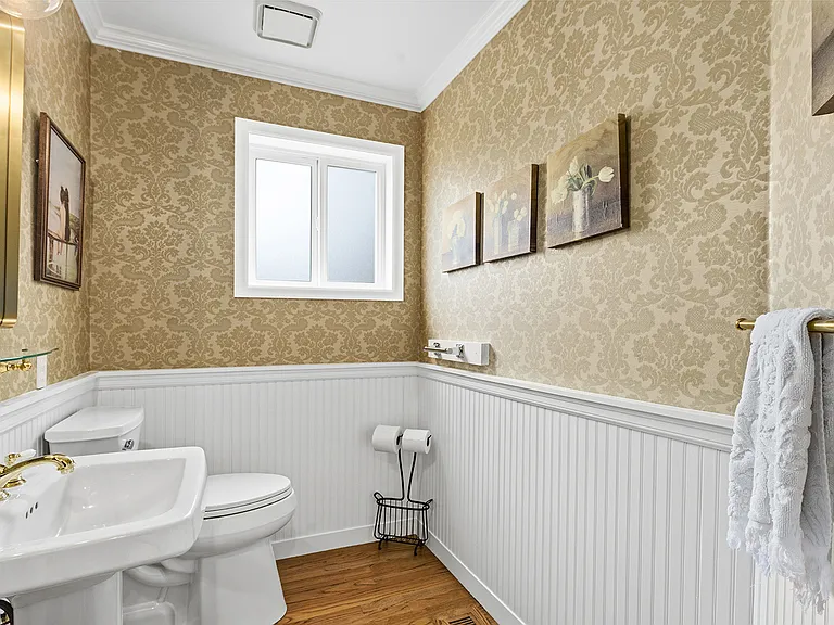 Formal Powder Room next to the entertaining spaces on the main level.