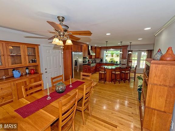 Open to dining area. Beautiful wood floors.