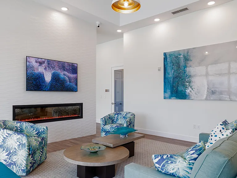 Imperial Crossing Luxury Apartment Homes community clubhouse seating area.