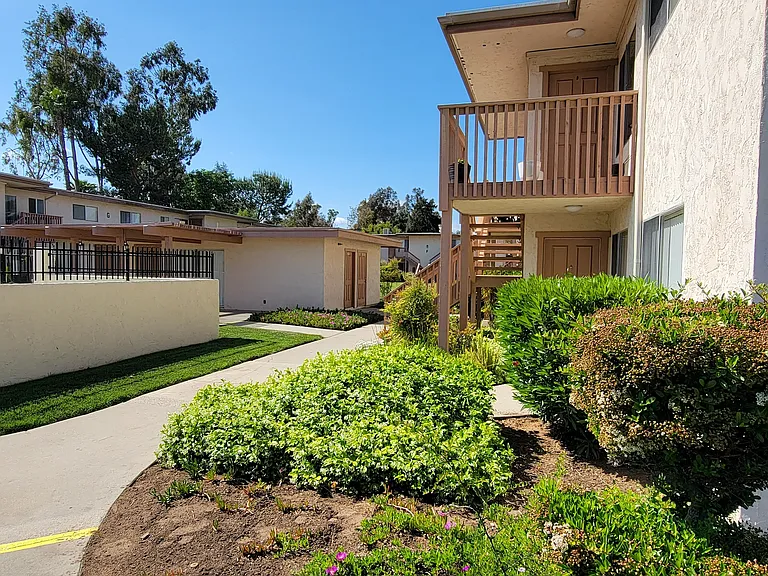 Beautiful landscaping and spa area at Plaza Verde Apartments in Escondido, California.
