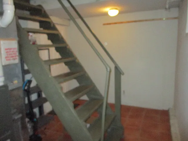 Basement access to the one car garage