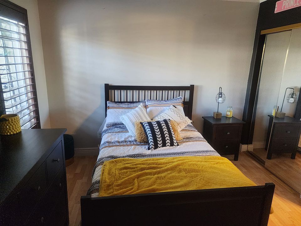 Fist floor bedroom, furnished with bed and dresser. Room size: 10x10 with attached private full bathroom.