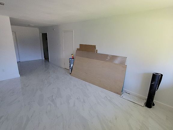 Den into kitchen/dinette