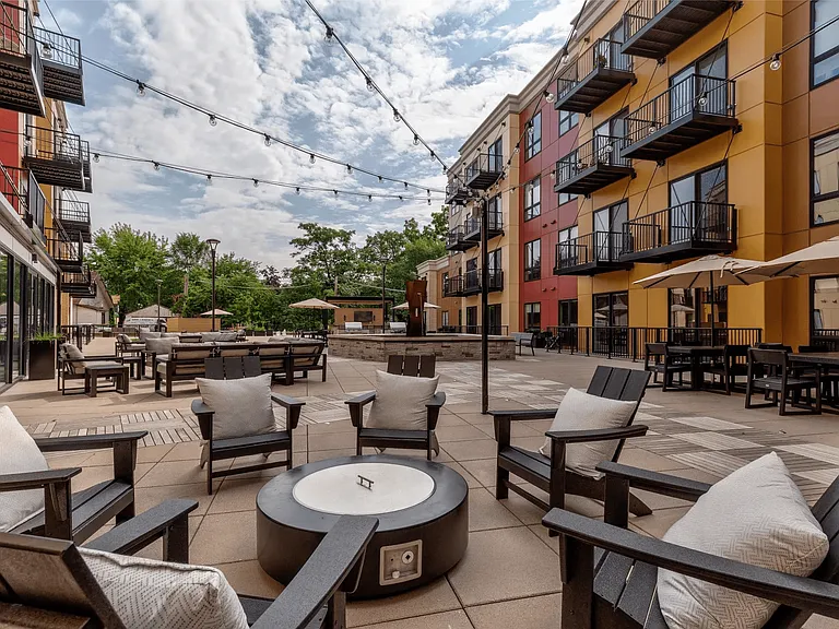 15,000 SF Amenity Deck with firepits, grills, outdoors TV's, bocce court, and pet run