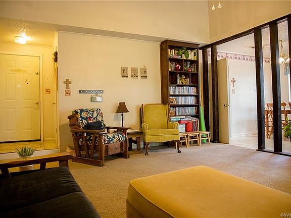 Another view of the spacious family room.  Opens to the hall, kitchen/eating area and back yard.