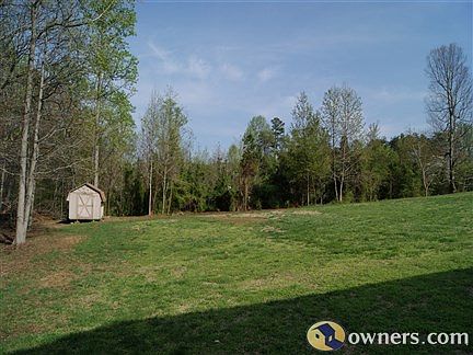 large back yard next to the woods