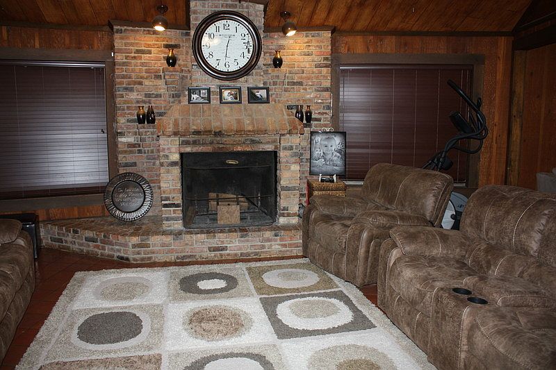 Living room w/wood burning fireplace