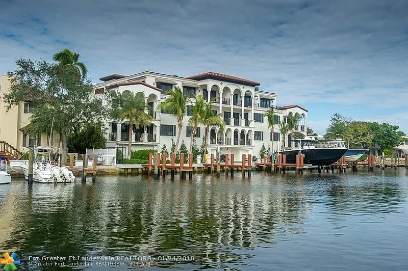 Vela Vista . 9 unit boutique luxury waterfront building completed in 2016.  Deeded 38' docks with unrestricted ocean access in m