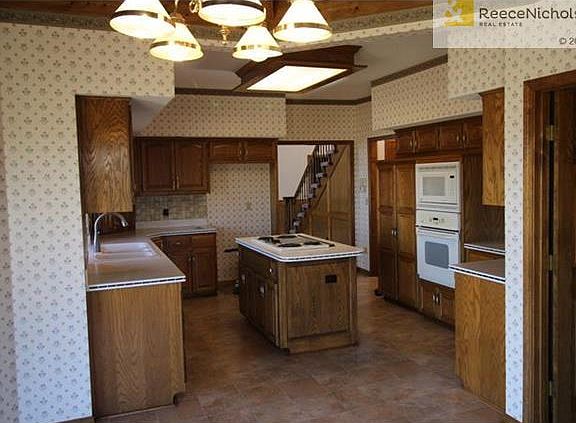 Kitchen with Corian counters.