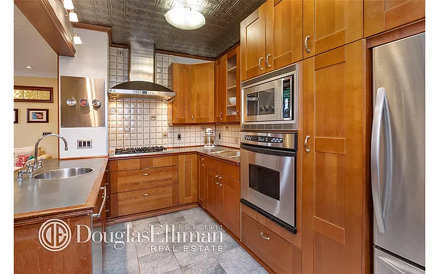 Sold by Douglas Elliman | media 9