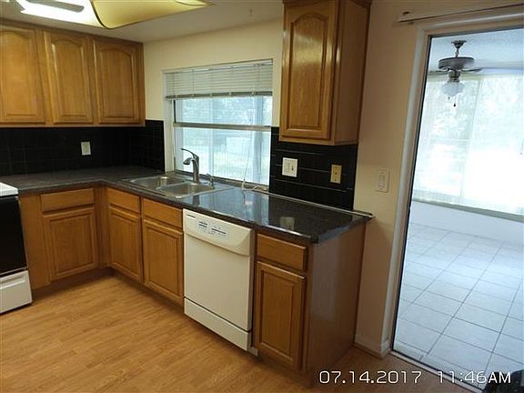 KITCHEN WINDOW OVERLOOKS LANAI