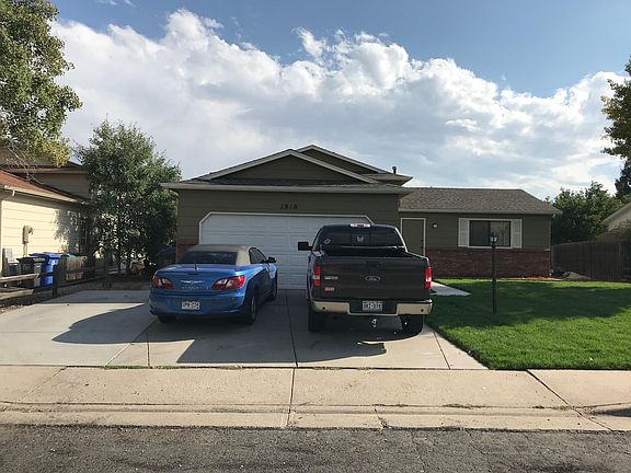 2 car garage with openers and extra paved parking for RV or additional vehicles.