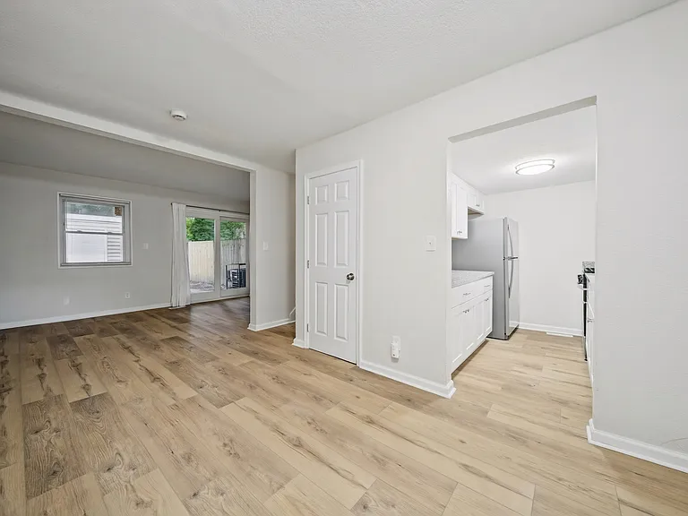 Living room (new flooring) / kitchen entrance