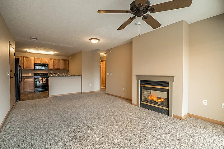 Our 1-bedroom Aura features a two-way fireplace in the living room and bedroom, giving you a touch of warmth throughout your whole home.