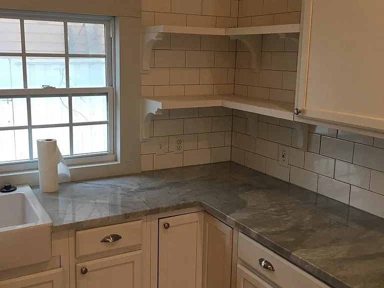 Upper corner shelves, marble countertops
