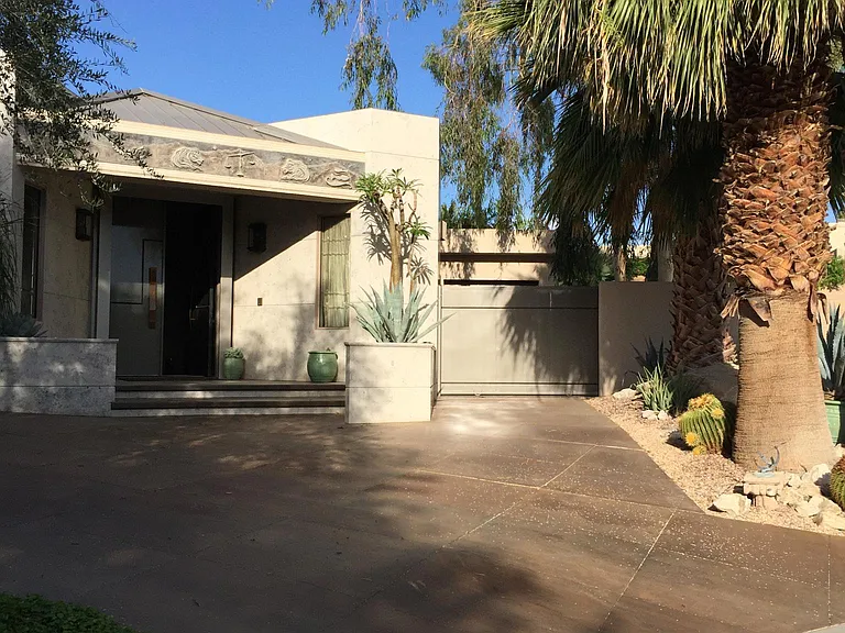 Entry to the estate at 45-447 Camino Del Rey 3 car garage plus private parking behind steel gate on right.