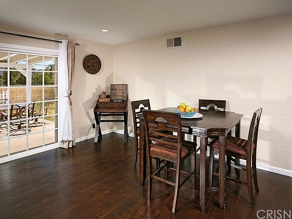 The dining area fittingly adjoins the kitchen and with its easy access to the backyard it is perfect for serving and entertaining your guess simultaneously.