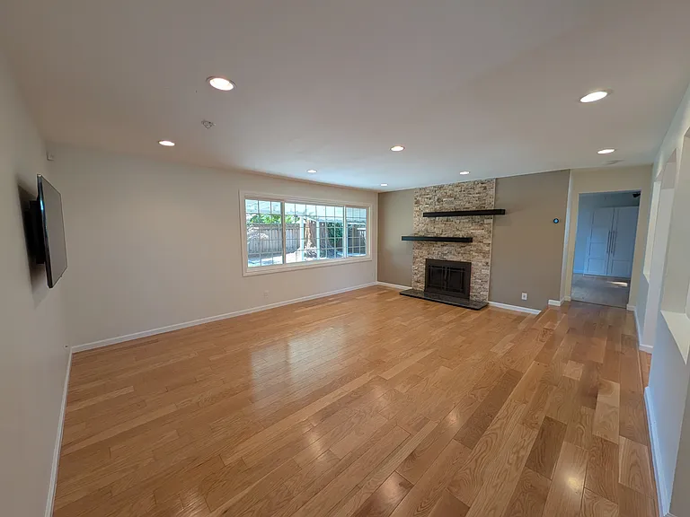 Living room facing towards backwards.