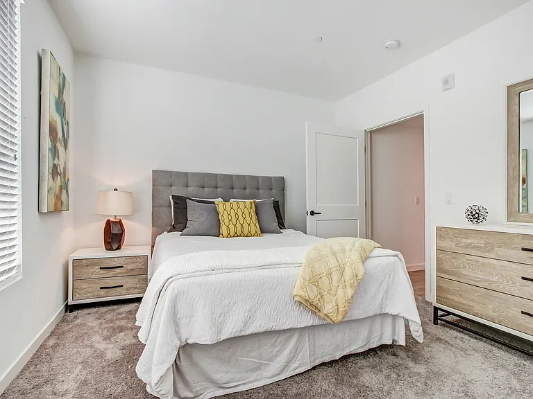 Bedroom with carpeting