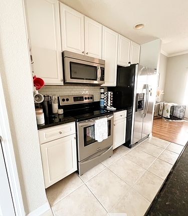 3rd image of 9856 W Park Village Dr #103