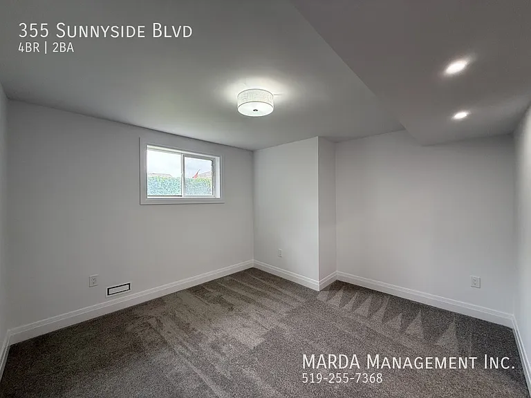355 Sunnyside Blvd — Photo 47