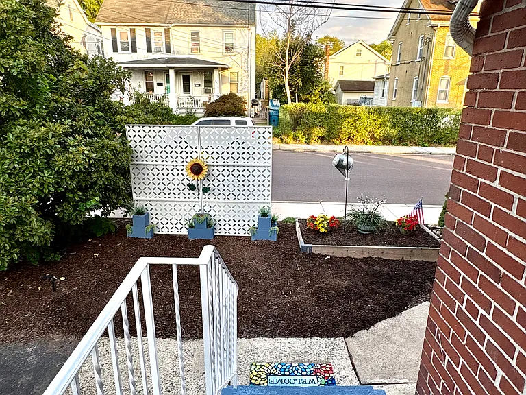 View from kitchen door adjacent to parking area