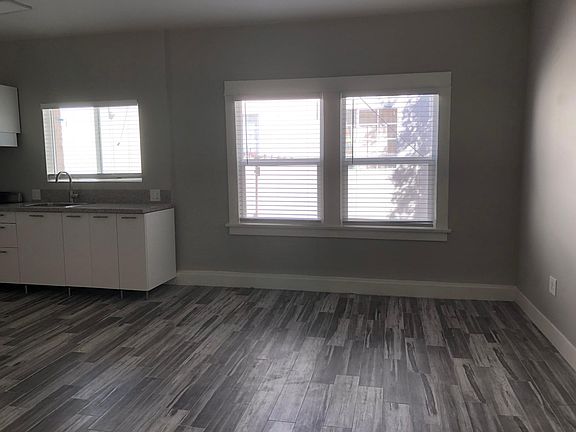 Bright windows - original brick wall has recently been exposed (not shown in picture)