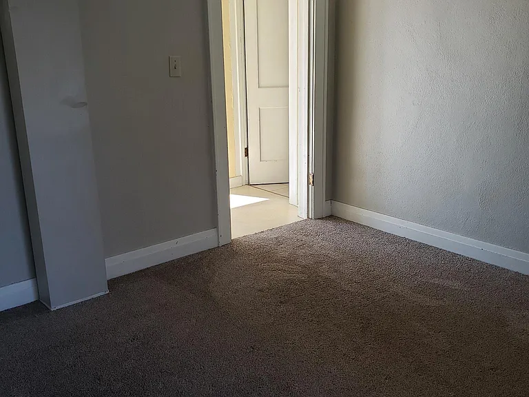 looking into kitchen from bedroom.