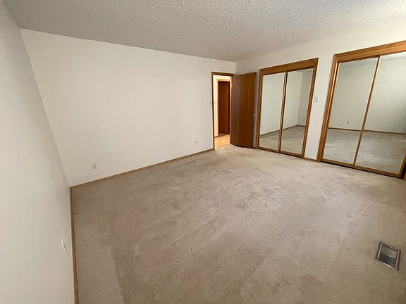 Master Bedroom with double mirrored closets