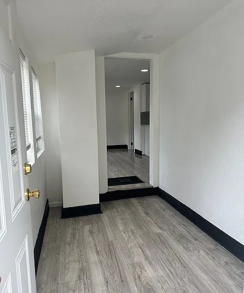 entrance to unit, walkin/mudroom area, for coats shoes ect